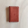 Cartera de cuero marrón